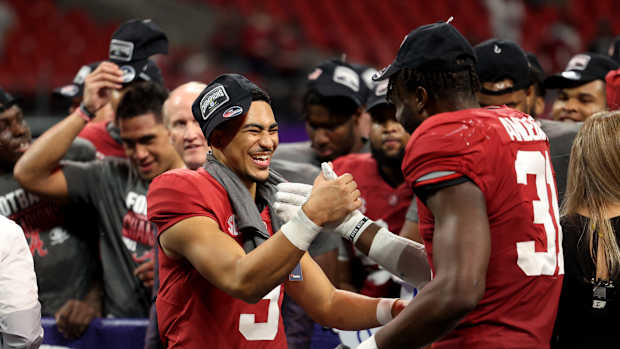 Dec 4, 2021; Atlanta, GA, USA; Alabama Crimson Tide quarterback Bryce Young (9) celebrates with linebacker Will Anderson Jr. (31) after their win during the SEC championship game after the Georgia Bulldogs at Mercedes-Benz Stadium. Mandatory Credit: Jason Getz-USA TODAY Sports